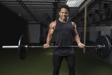 A man working out in a gym.