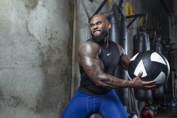 Man holding medicine ball